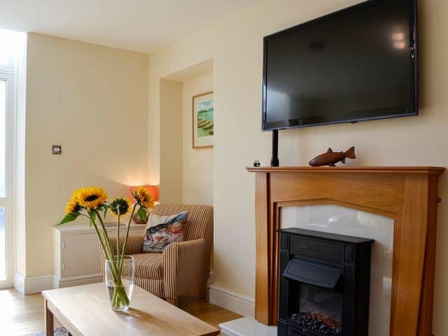 Relax in th eliving room | Ghillie Cottage, Cockermouth