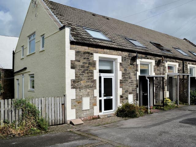 One of a terrace of lovely Cumbrian cottages converted from a chapel | Ghillie Cottage, Cockermouth