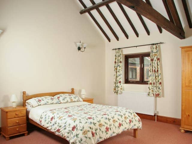 Characterful double bedroom | Littlewoods Barn - Moor Farm Stable Cottages, Foxley, near Fakenham