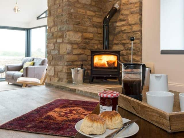 Comfortable living area with wood burner | Moorgate Cottage - Moorgate Farm, Kelbrook, near Barnoldswick