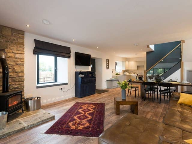 Comfortable living area with wood burner | Moorgate Cottage - Moorgate Farm, Kelbrook, near Barnoldswick