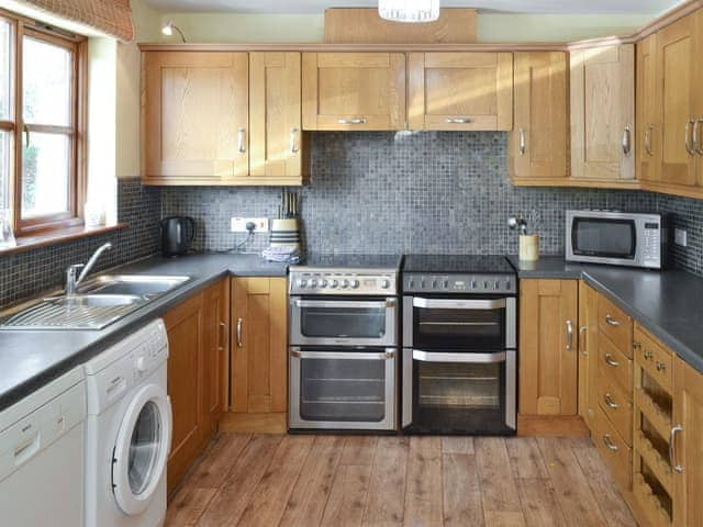 Well-equipped fitted kitchen | Chestnut House - Sherrill Farm Holiday Cottages, Dunterton, near Tavistock