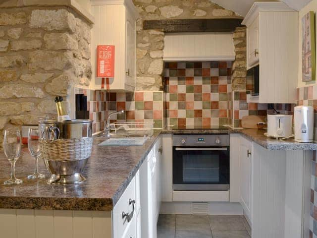 Well equipped kitchen area | Fuchsia Cottage - Sands Farm Cottages, Wilton near Pickering