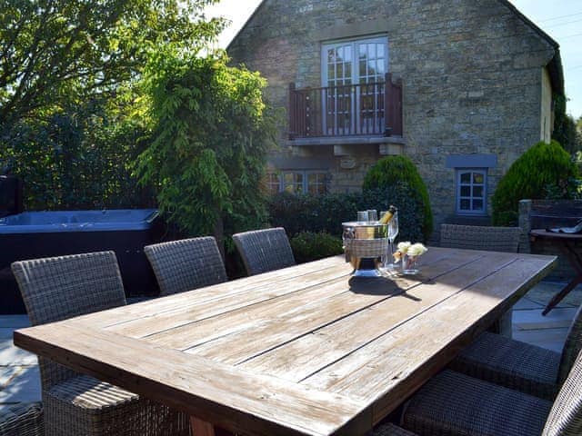 Enclosed decked patio with garden furniture and hot tub | Chapel Lodge - Sands Farm Cottages, Wilton near Pickering