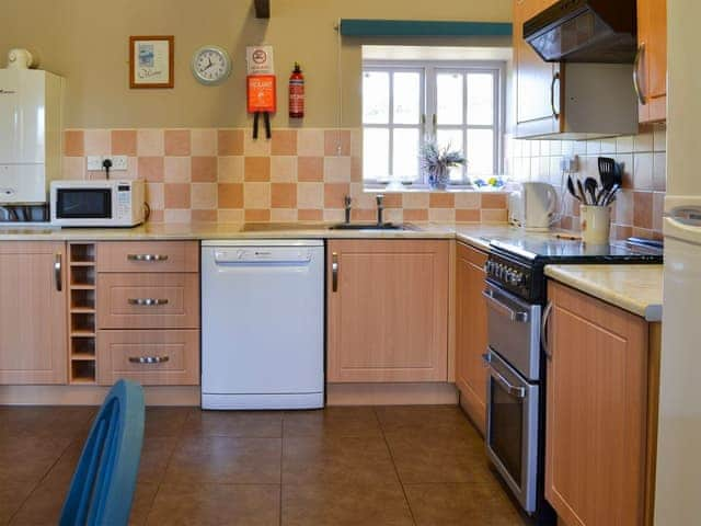 Kitchen and dining area | Honeysuckle Cottage - Sands Farm Cottages, Wilton near Pickering