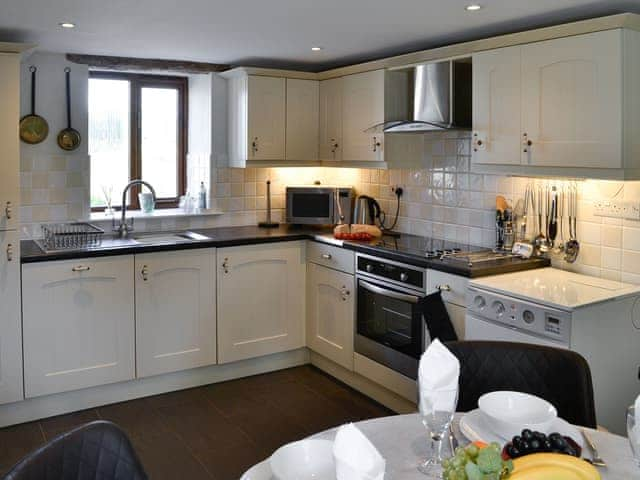 Kitchen with dining area | Swallow Barn, Torpenhow, near Wigton