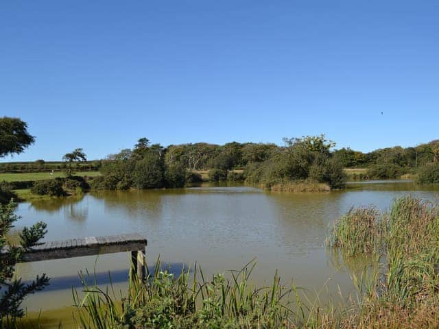 One of the fishing lakes in the grounds available to guests | Heath Farm Cottages - Cowslip, Heath Farm - Old Mill - Heath Farm , Bradworthy, near Hartland