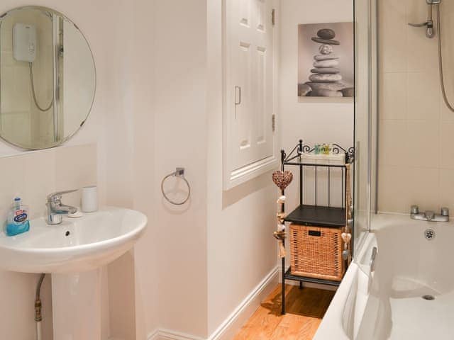 Bathroom with shower over the bath | Sandy Toes, Beadnell, near Alnwick