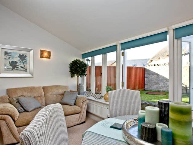 Sun room | Pebble Beach Cottage, West Lulworth