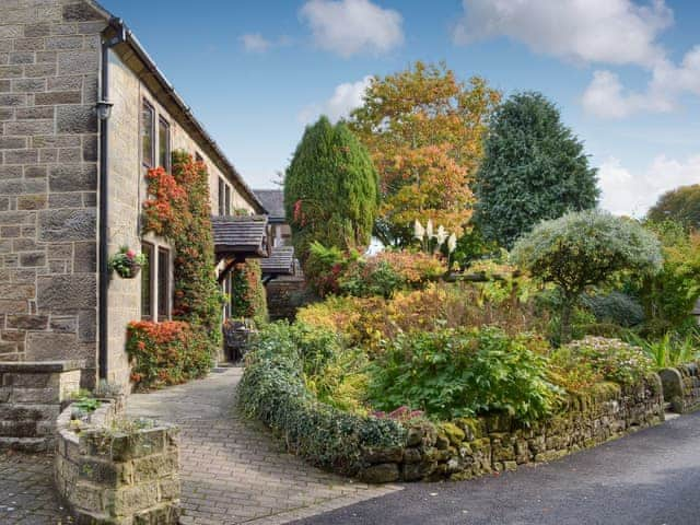 Exterior and garden | Water Bailiffs Lodge - Lumsdale Cottages, Lumsdale, Tansley Wood, near Matlock