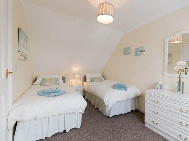 Twin bedroom | 2 Seabreeze Cottages, Brightstone