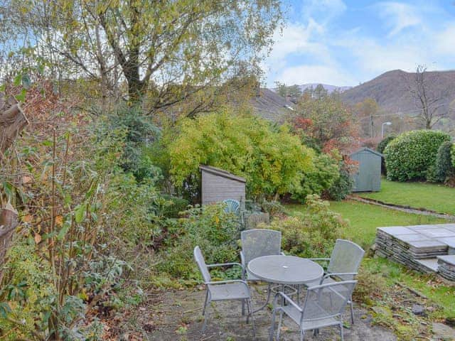 Sitting out area in the attractive garden and grounds | Hillside Cottage, Ambleside