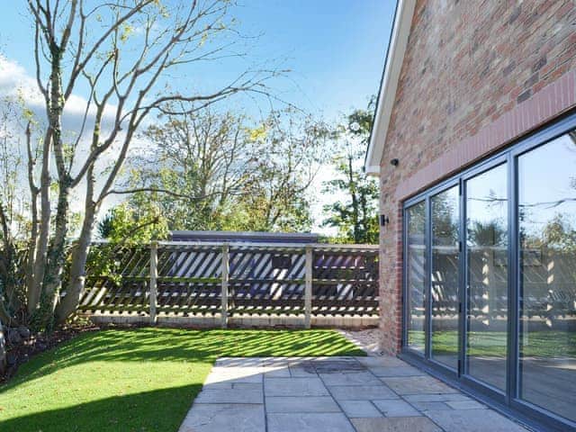 Enclosed patio area | The Carriage House - Station House Cottages, Upper Poppleton, near York