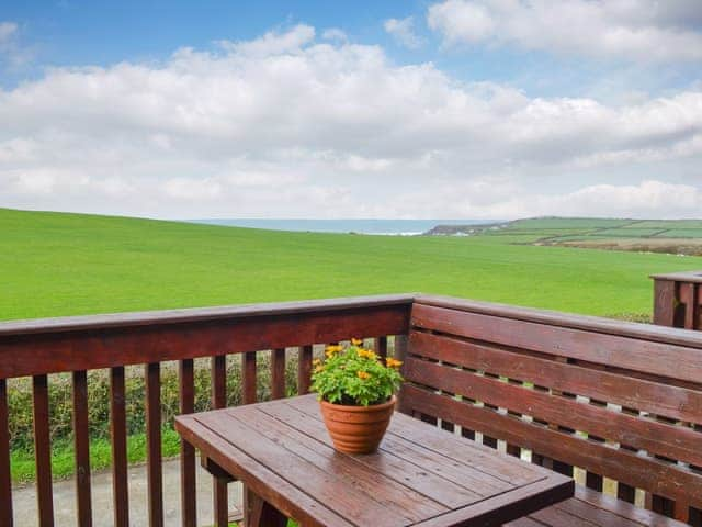 Decking with wonderful sea views | Barn Cottage - Quinceborough Farm, Widemouth Bay, near Bude