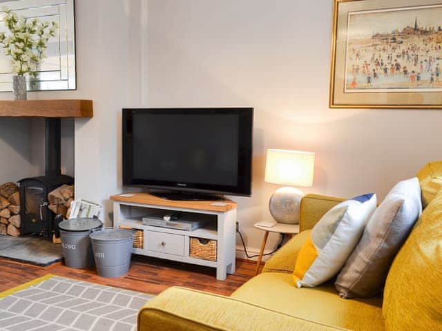 Comfortable living area with wood burner | The Horseshoes, Hornsea