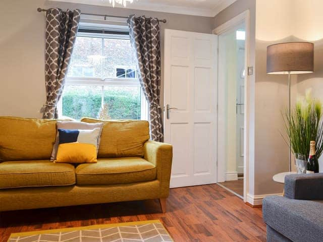 Comfortable living area with wood burner | The Horseshoes, Hornsea