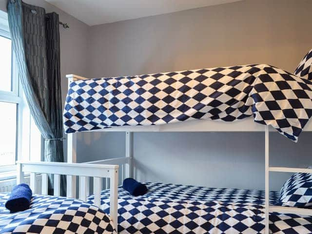 Bedroom with bunk bed and a single bed | The Horseshoes, Hornsea