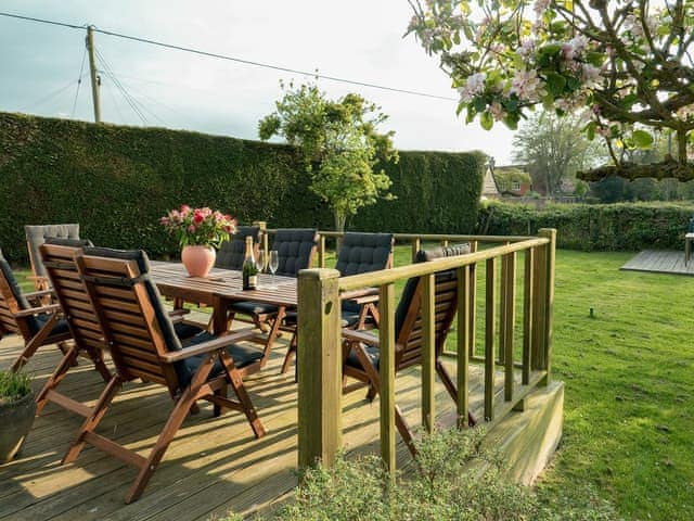 Charming decked area in the garden | Holly Cottage, Pett