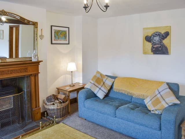 Cosy wood burner in the living room | Bumblebee Nook, Yanwath, near Pooley Bridge