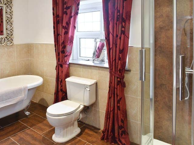 Bathroom with free-standing bath and shower cubicle | Bumblebee Nook, Yanwath, near Pooley Bridge