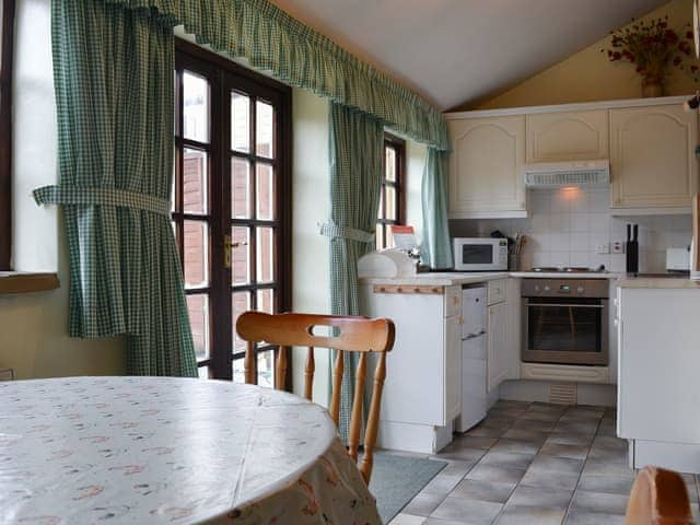 Kitchen and dining area | Poppy Cottage - Sands Farm Cottages, Wilton near Pickering