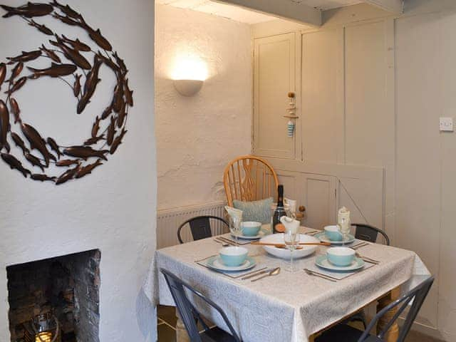 Modest fireside dining area | Sage Cottage, St Columb Major