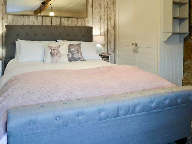 Inviting bedroom with a king sized bed | Thorpe Cottage, Masham