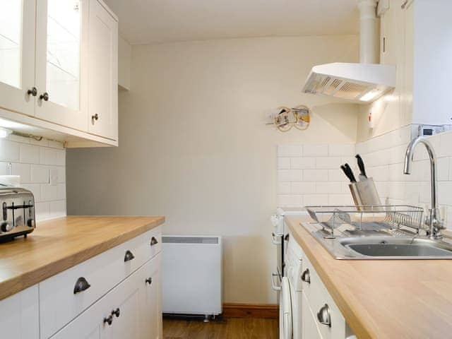 Galley-style fitted kitchen | The Tottsie, Bassenthwaite, near Cockermouth