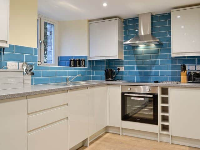 Well-equipped fitted kitchen | Tarn Rigg Cottage - Ormathwaite Farm Cottages, Underskiddaw, near Keswick