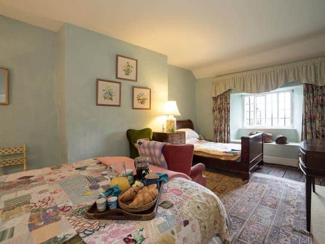 Family bedroom | The Old Priory Cottage, Dunster, near Minehead