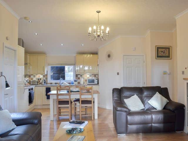 Living area through to the dining and kitchen areas | Oak Lodge, Clatworthy, near Williton