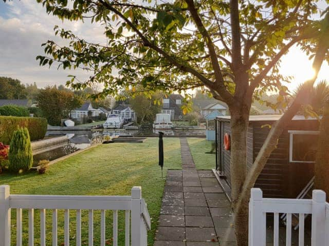 Delightful garden with access to the river | The Willows, Hoveton, near Wroxham