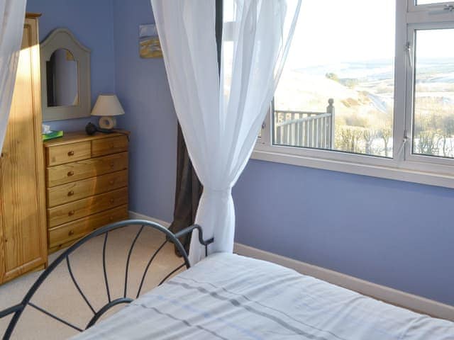 Light and airy four poster bedroom | Rowan Cottage - Whitelee Farm, Bryness, near Otterburn