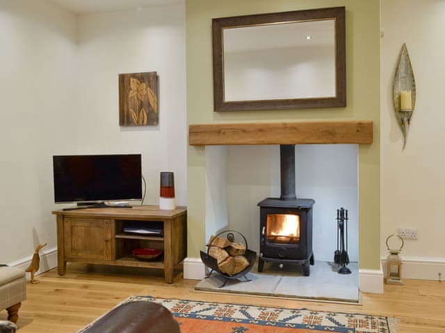 Welcoming living room with wood burner | Riverholme, Bassenthwaite, near Keswick