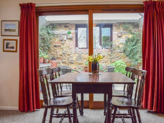 Kight and bright dining area | The Blacksmith Shop, Shorwell