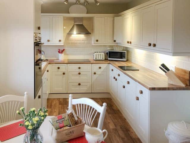 Well presented kitchen/ dining area | Carr House, Cayton, Scarborough