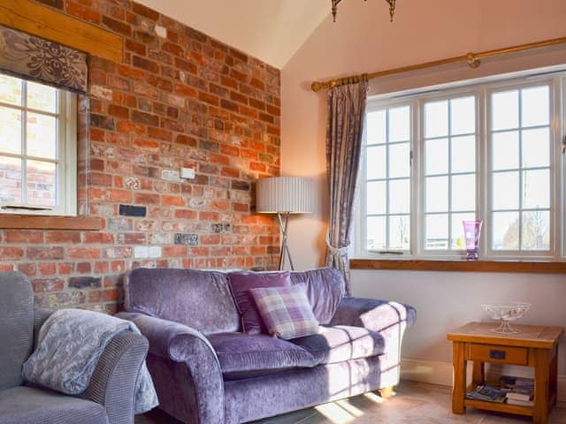 Charming living area with exposed brickwork | Cozy Cottage - Holtby Grange Cottages, Holtby, near York