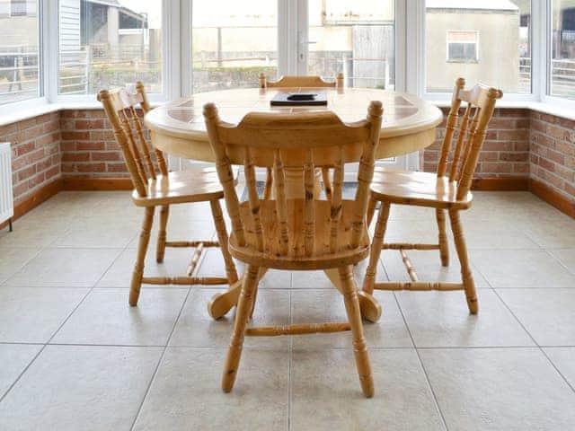 Dining area within conservatory | Stable Cottage 3 - Moor Farm Stable Cottages, Foxley, near Fakenham