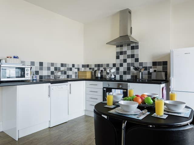 Modern style kitchen | Sunny Beach Apartment, Shanklin