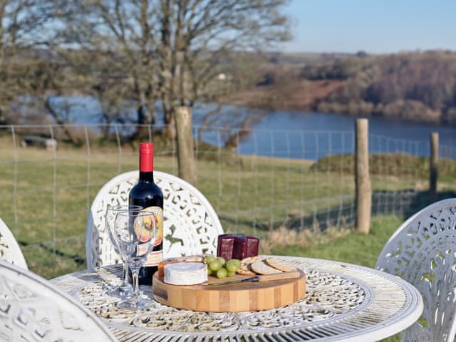 Relaxing sitting-out-area | The Barn by The Lake, Brompton Regis, near Dulverton