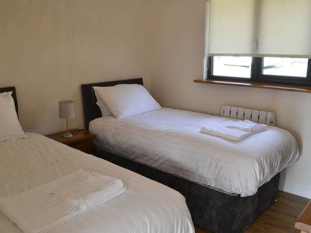 Twin bedroom | Juniper Lodge - Otterburn Hall Lodges, Otterburn, near Bellingham