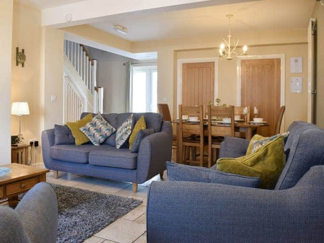 Lounge area and living and dining room | Tommy&rsquo;s Cottage, Keswick