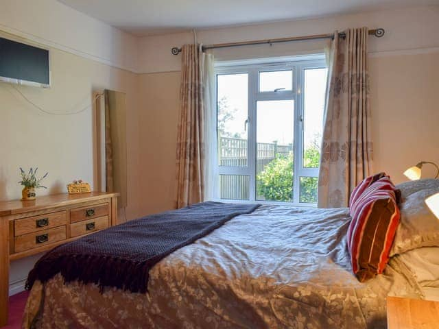 Comfortable double bedroom | Sea View Lodge, Rousdon, near Lyme Regis