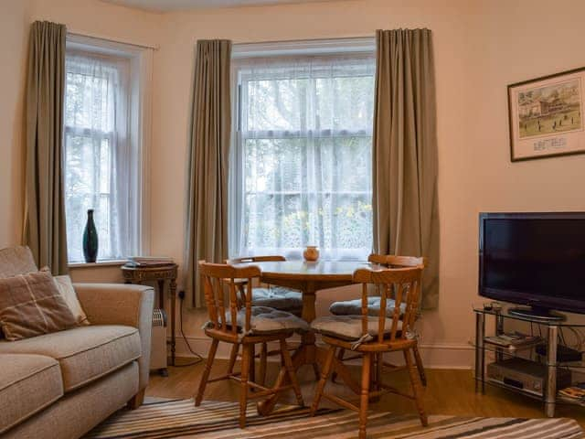 Living room with dining area | Steephill Lodge, Ventnor