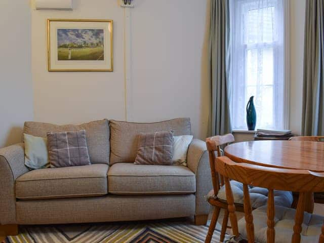 Living room with dining area | Steephill Lodge, Ventnor