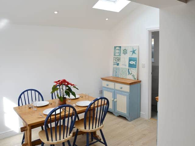 Stylish dining area | Beach Cottage, Winterton-on-Sea