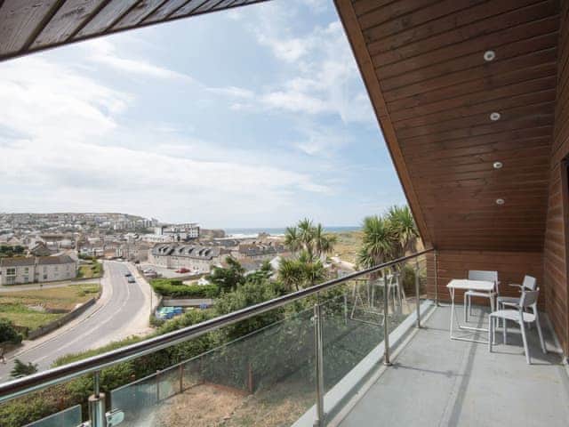 View from balcony over village and to the sea | Lyndhurst, Perranporth