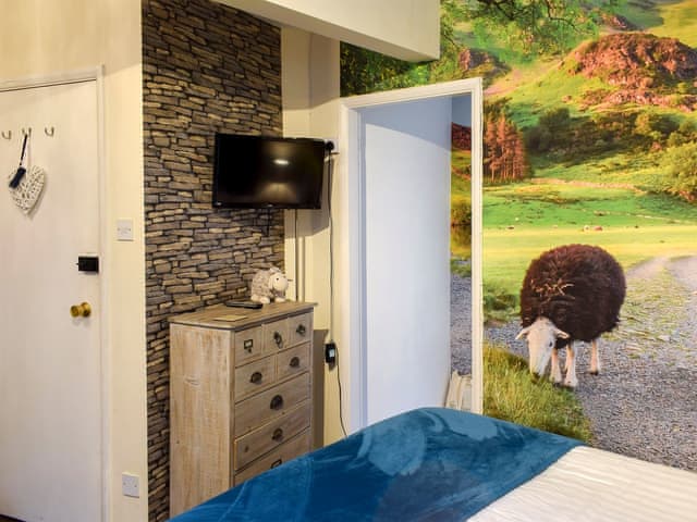 Bedroom area with double bed | The Stable Nest - The Stables Apartments, Bowness on Windermere