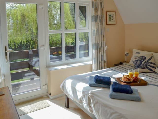 Light and airy double bedroom | Villa 9, Cromer