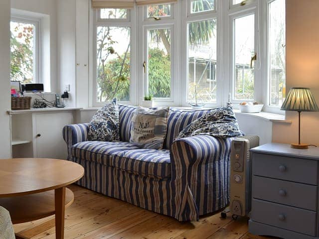 Comfortable living/dining room | Beech Cottage, St Lawrence, near Ventnor